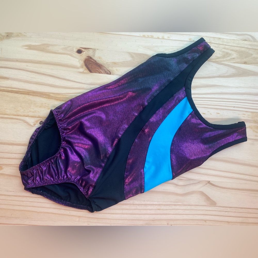 Danskin black,purple, and blue gymnastics leotard size S (6/6x)